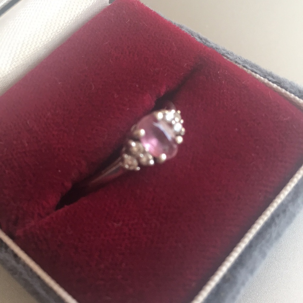 Pink topaz with diamond side stones